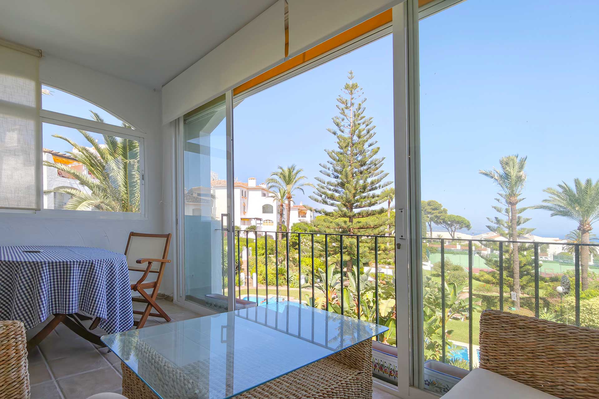 Living room with marble fireplace and terrace access, Cerro Blanco Nueva Andalucia