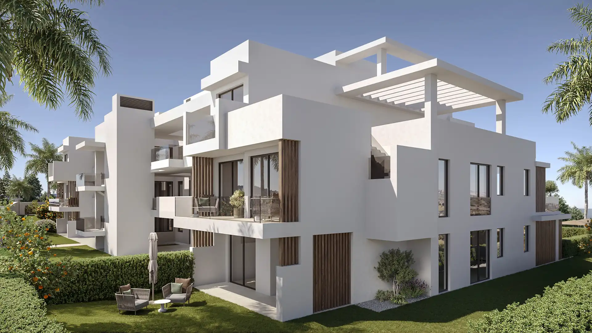 Modern white residential exterior with gardens and underground parking access