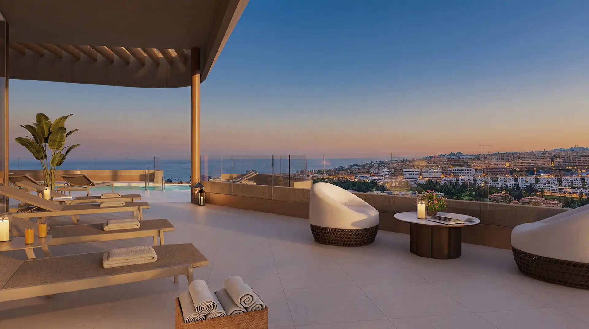 Rooftop terrace with panoramic sea views at dusk
