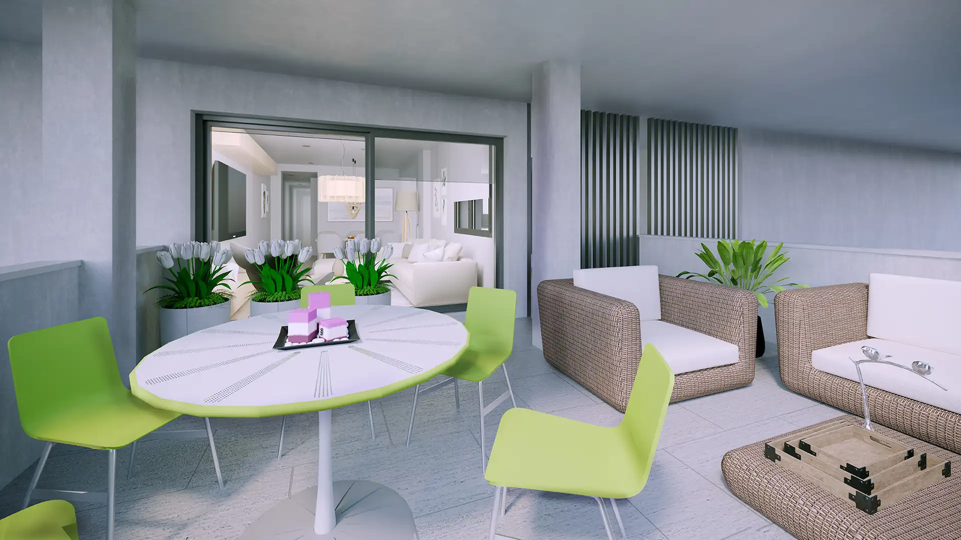 Terrace lounge area with green chairs and wicker furniture in Fuengirola