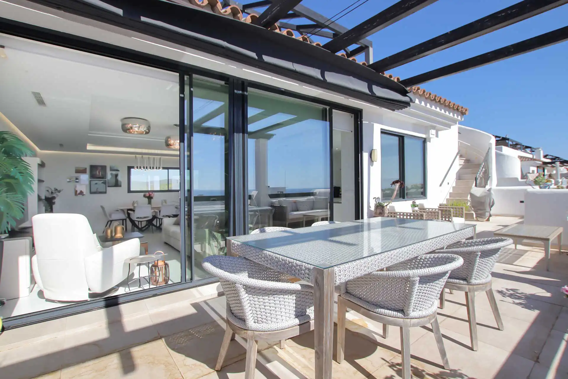 Main terrace with outdoor dining area, duplex penthouse in Lotus Doña Julia, Casares