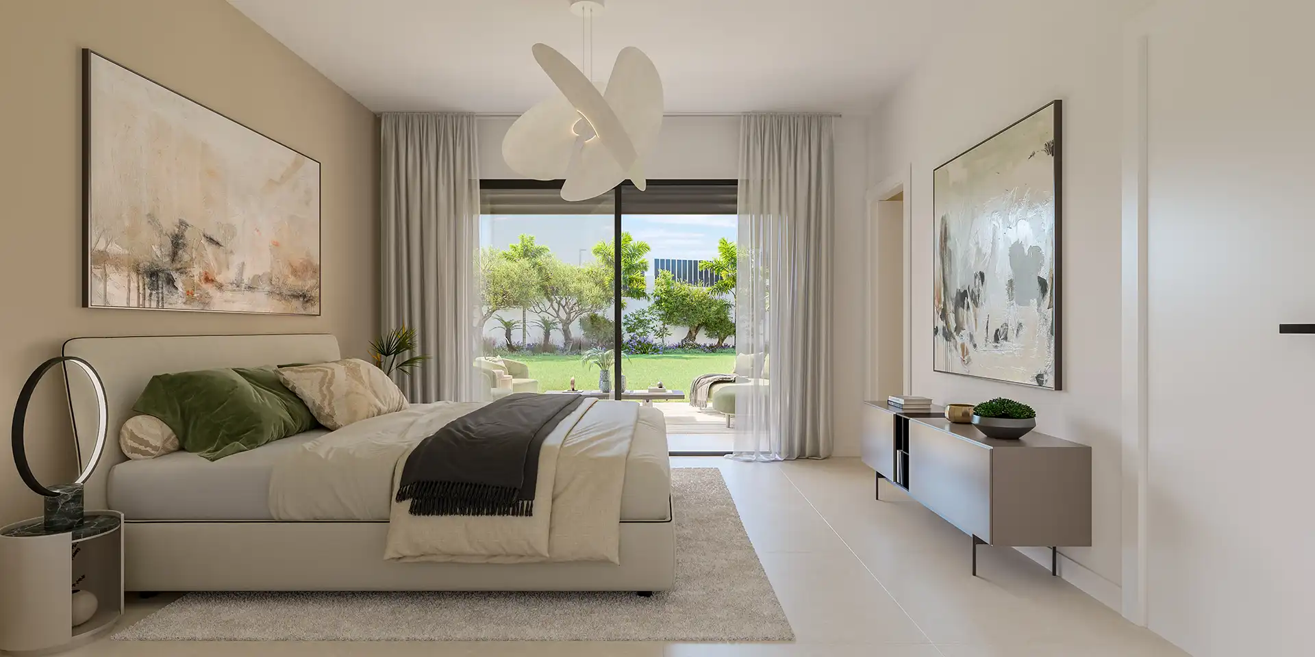 Bright master bedroom with direct access to a garden terrace in Estepona