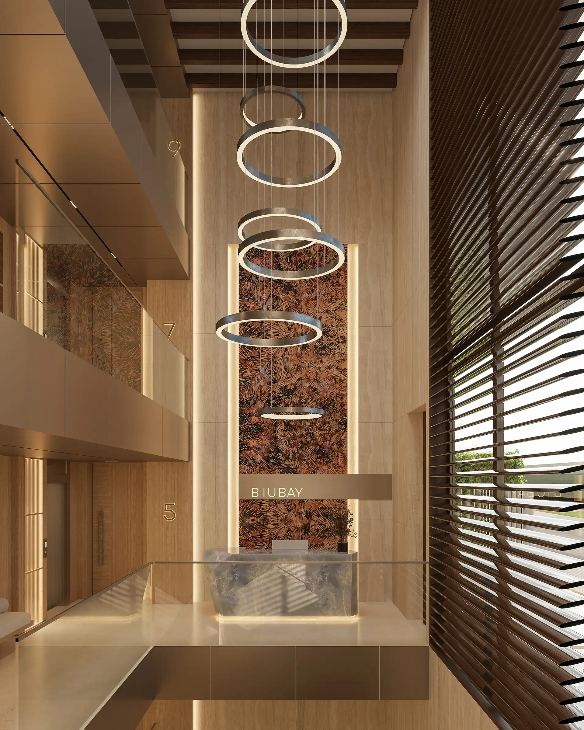Hotel-style lobby with ring chandelier atrium
