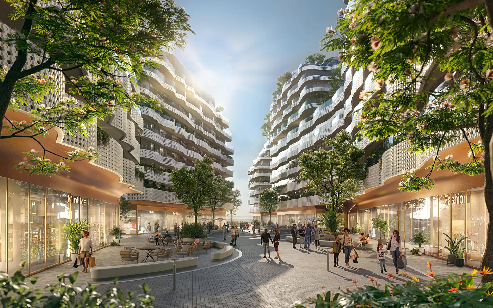 Retail promenade beneath white balconied residential towers at Elysium Bayside, Gibraltar