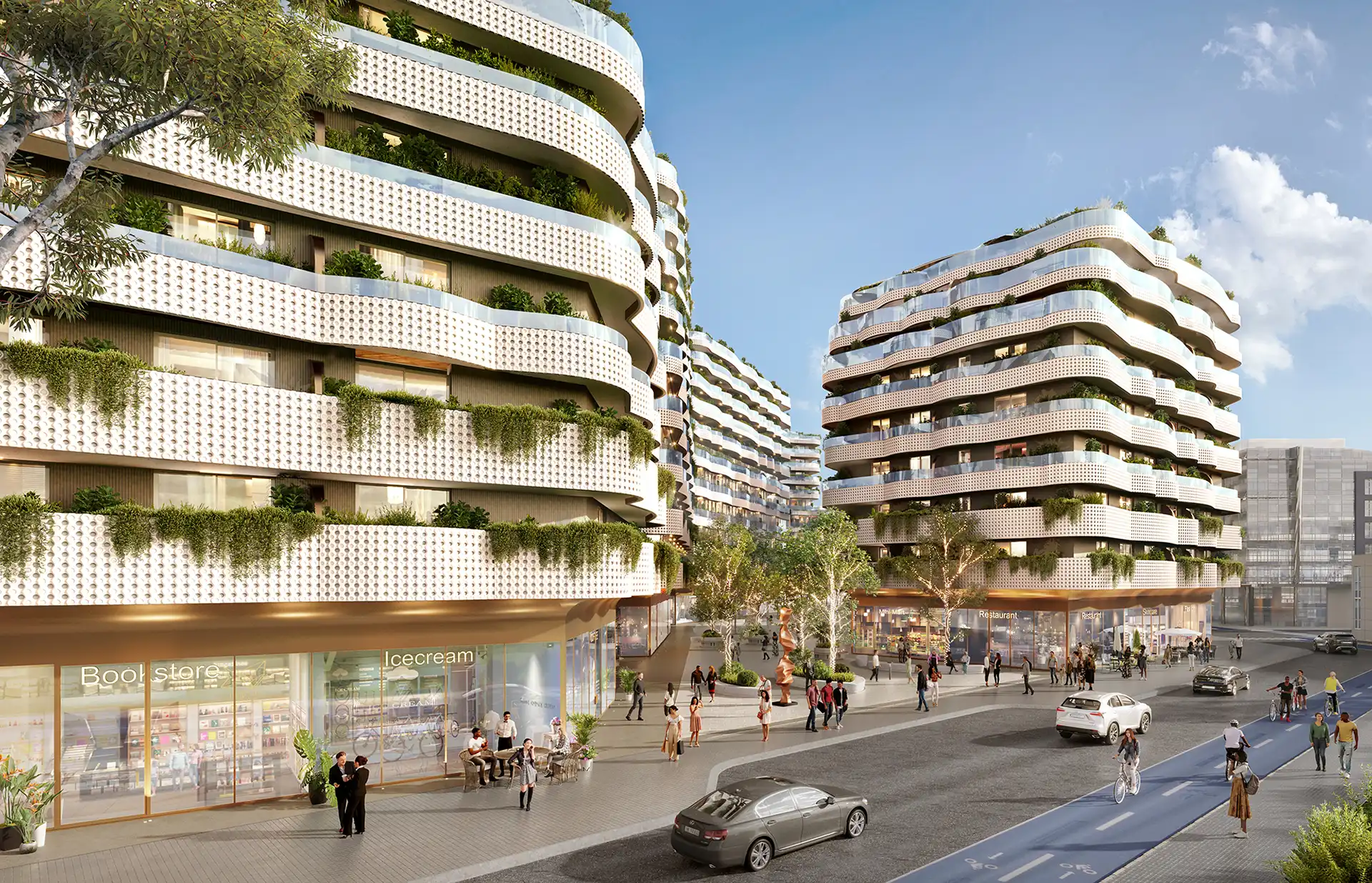 Residential towers with planted green balconies above street-level shops in Gibraltar