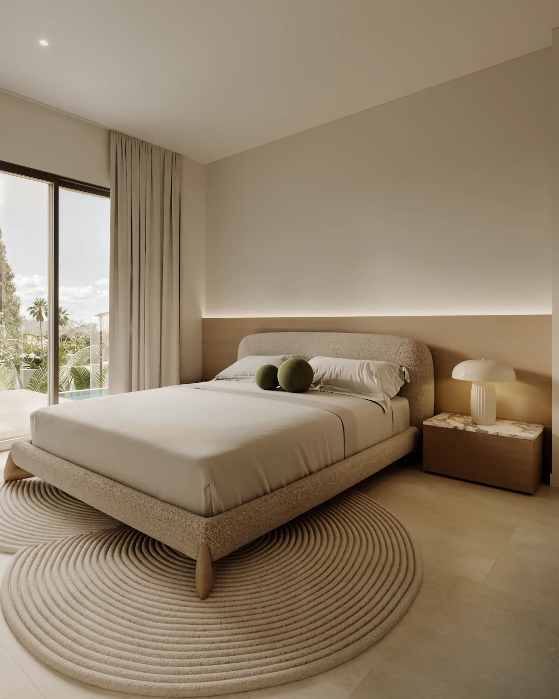 Master bedroom with warm beige tones and views of the private pool garden