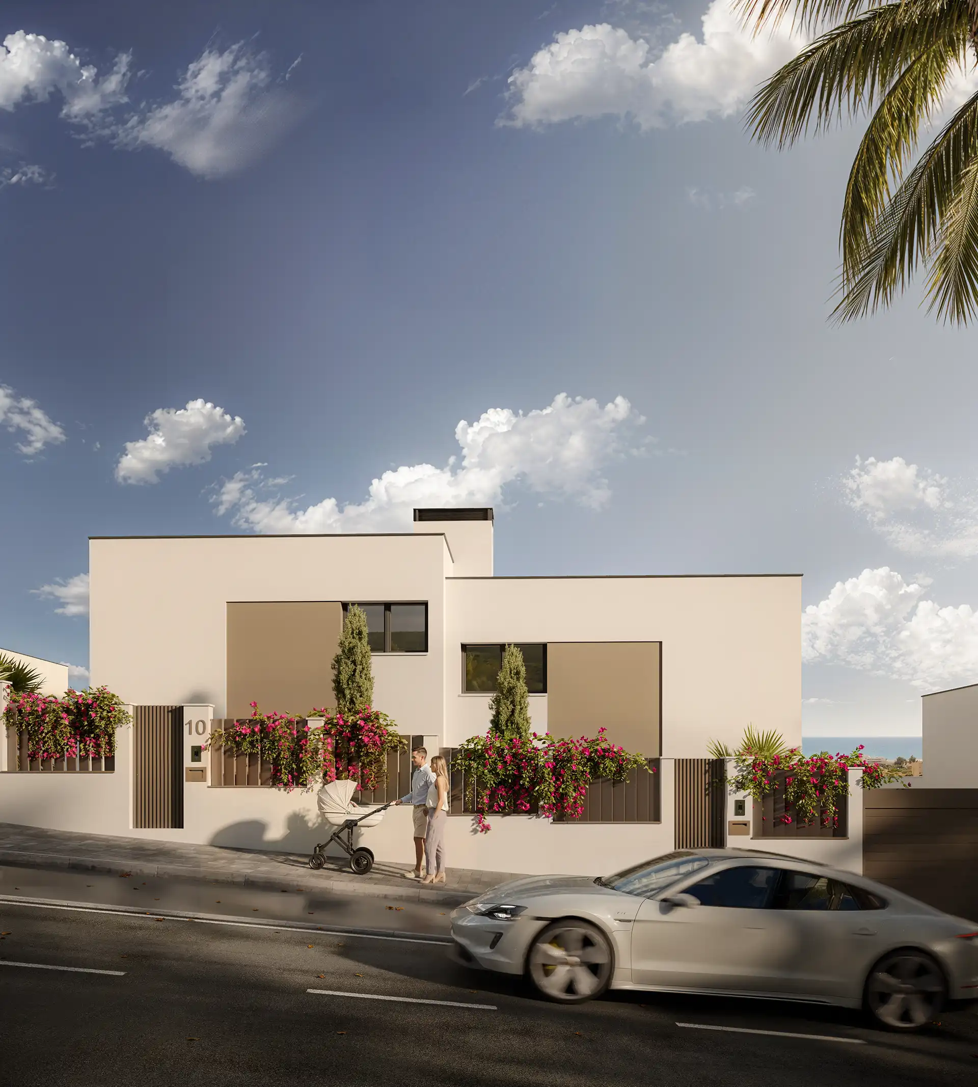 Modern Mediterranean villa façades with bougainvillea on a quiet Manilva street
